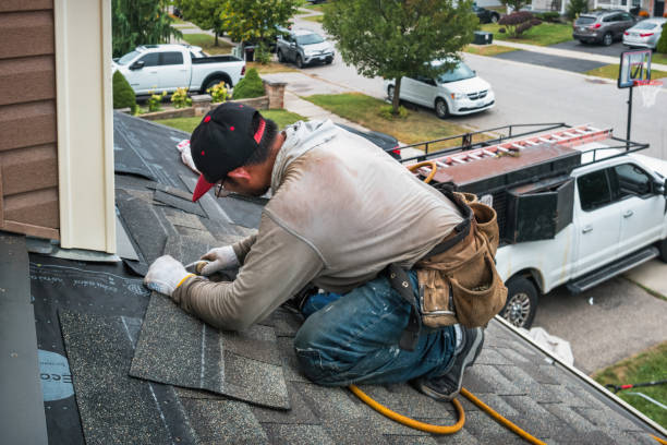 Professional Flat Roof Repair technician working in Elk River, ID